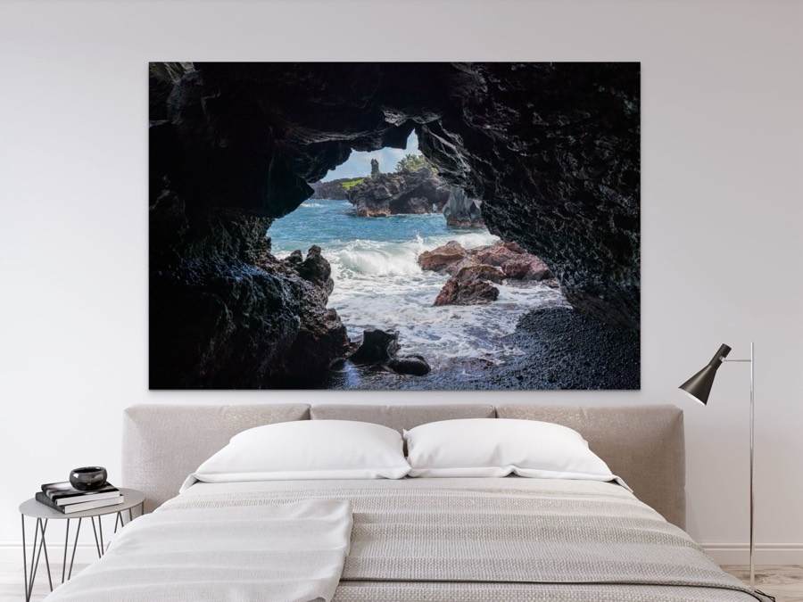 Maui black sand ocean cave coastal wall art metal print, shown in a room